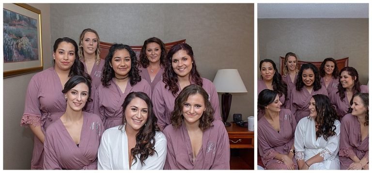 bride and her bridesmaids sitting on a bed
