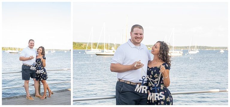 couple holding mr. and mrs. signs